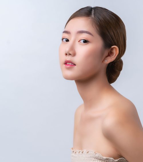 skincare and makeup concept beautiful asian female woman with healthy facial skin close up portrait studio shot