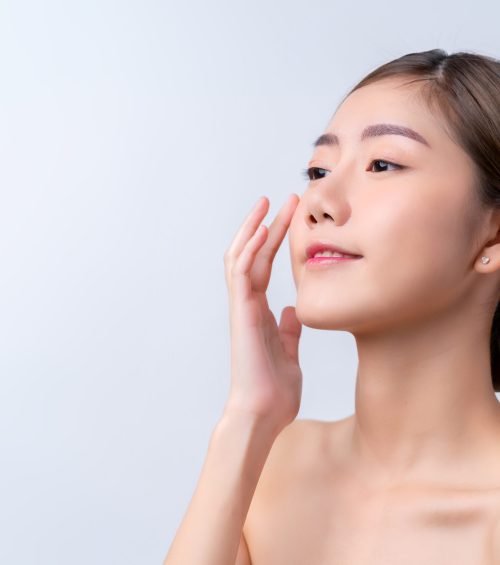 skincare and makeup concept beautiful asian female woman with healthy facial skin close up portrait studio shot